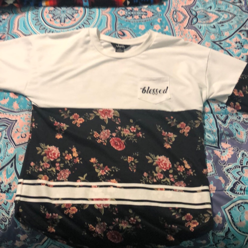 A long sleeve shirt with flowers on it